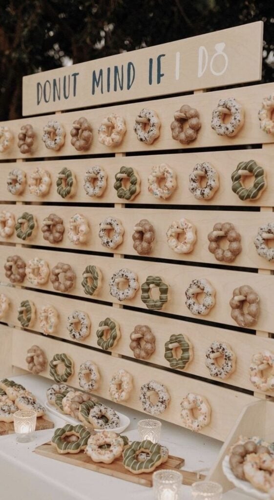 Assorted decorated donut wreaths display at Confetti & Roses bakery.