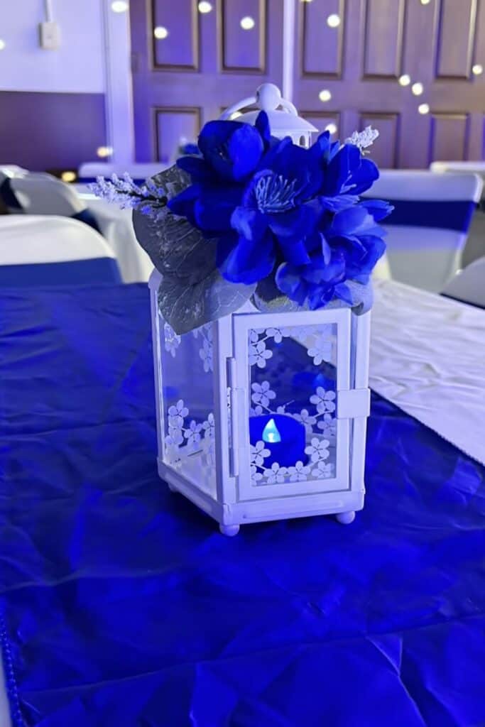 Blue floral centerpiece for wedding or event decor.