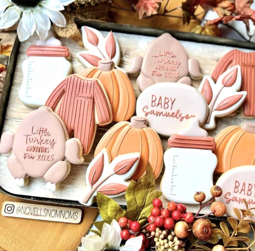 Delicious fall-themed decorated cookies with pumpkins, leaves, and personalized messages.
