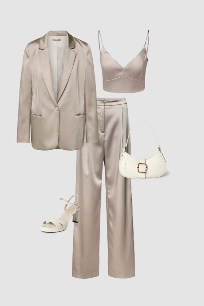 Elegant beige satin suit with heels, stylish handbag, and satin crop top for women's fashion.