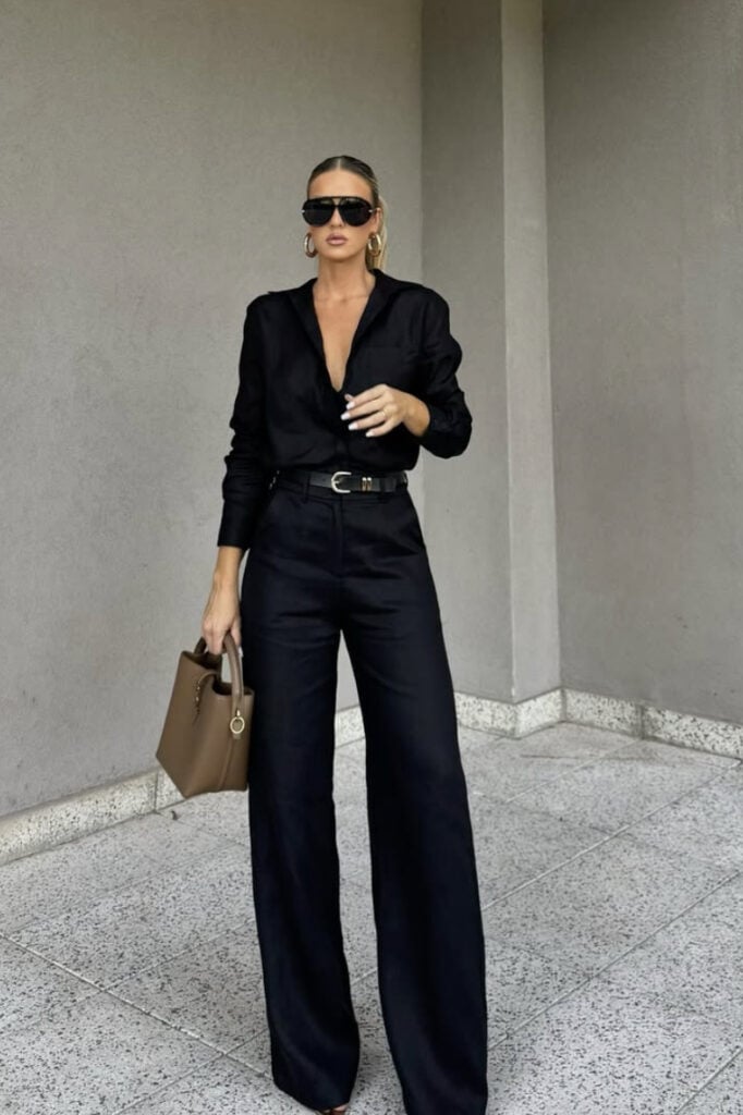 Elegant black outfit with wide-leg pants and blazer for women.