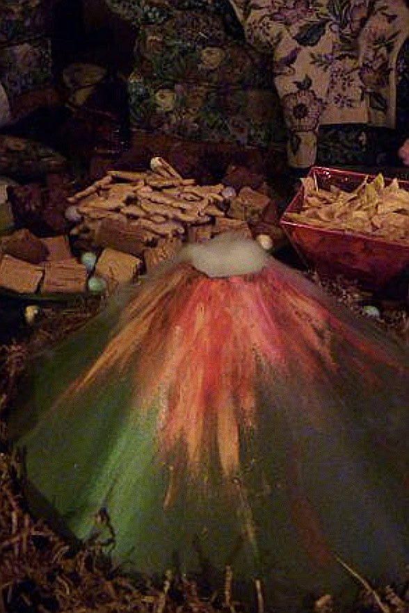Colorful erupting volcano decoration for parties and celebrations.