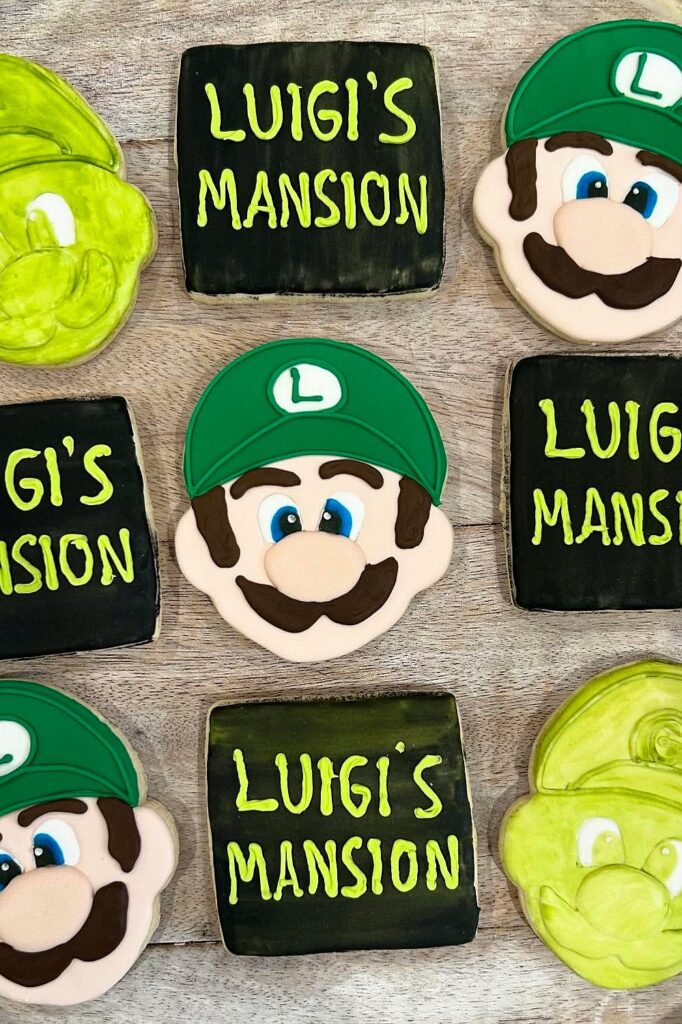 Luigi's Mansion themed cookies and decorations for birthday party celebration.