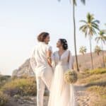 a man and woman in wedding attire