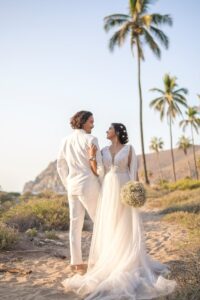 a man and woman in wedding attire