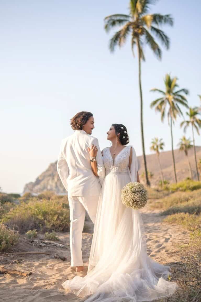 a man and woman in wedding attire