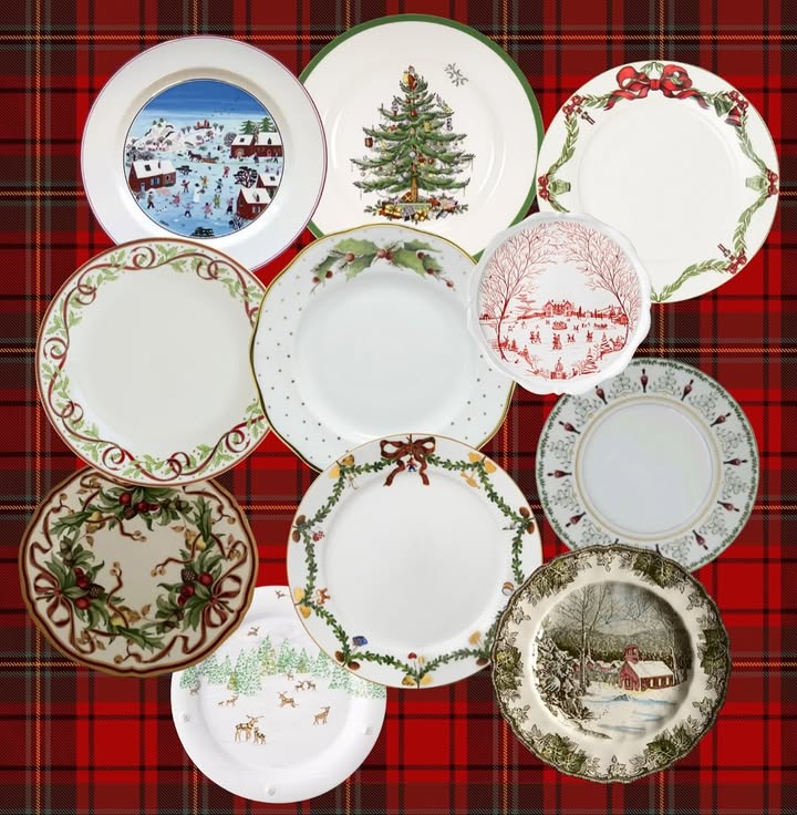Collection of festive Christmas plates with holiday designs on red plaid background.